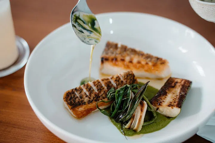 col Roasted Snapper, zucchini, grilled onions, vin jaune sauce