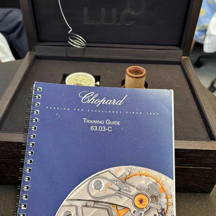 An illustrated Chopard watchmaking training guide showing the sequence for disassembling and reassembling the L.U.C Calibre 63.03-C movement, with detailed diagrams of the movement’s components and assembly order.