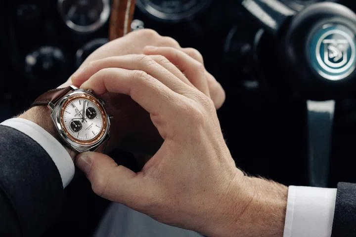 Breitling Top Time B01 Chronograph 41 Tribute to Aston Martin DB5 with a silver dial, black chronograph counters and brown leather strap.