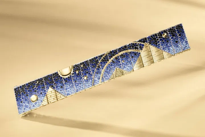 Van Cleef & Arpels Fascinating Egypt high jewellery collection’s Paysage merveilleux bracelet, which depicts pyramids under a night sky, in white and yellow gold, blue sapphires and black spinels