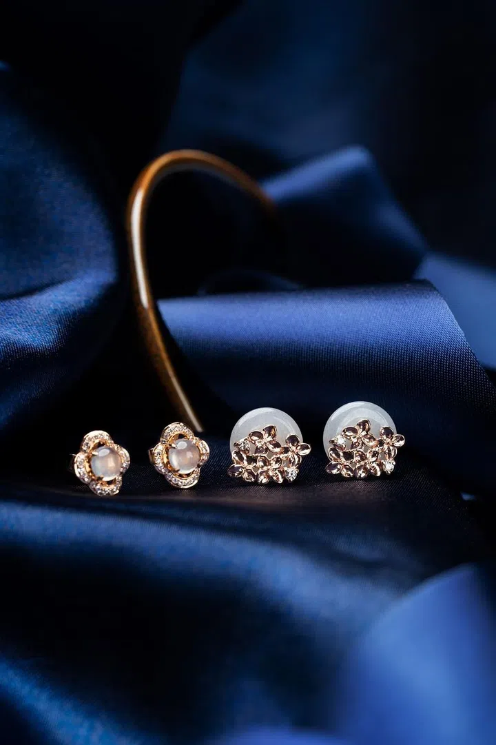 Earrings from the Warison Rose (left) and Hydrangea (right) collections.
