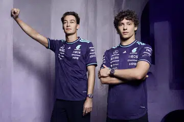 George Russell and Kimi Antonelli wearing the purple IWC Pilot’s Watch Chronograph 41 Mercedes-AMG PETRONAS Formula One Team.