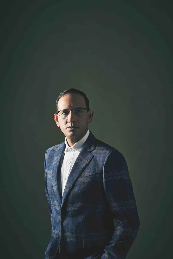 Rajeev is wearing a wool checkered jacket, from Etro and a cotton shirt from Brunello Cucinelli.