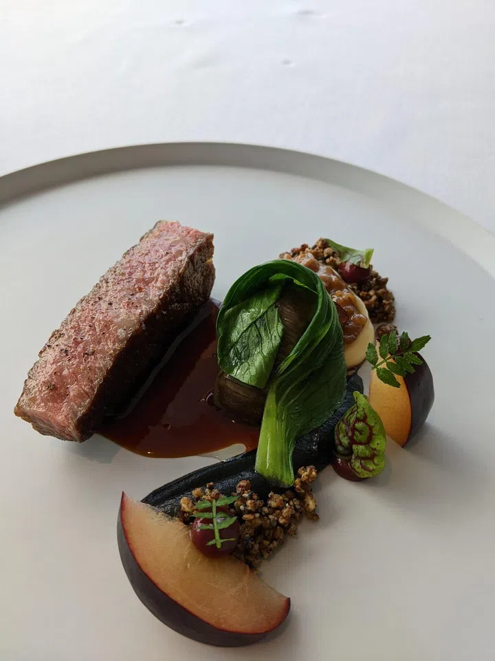 Miyazaki wagyu with eggplant and plums. (Photo: Kenneth SZ Goh) 