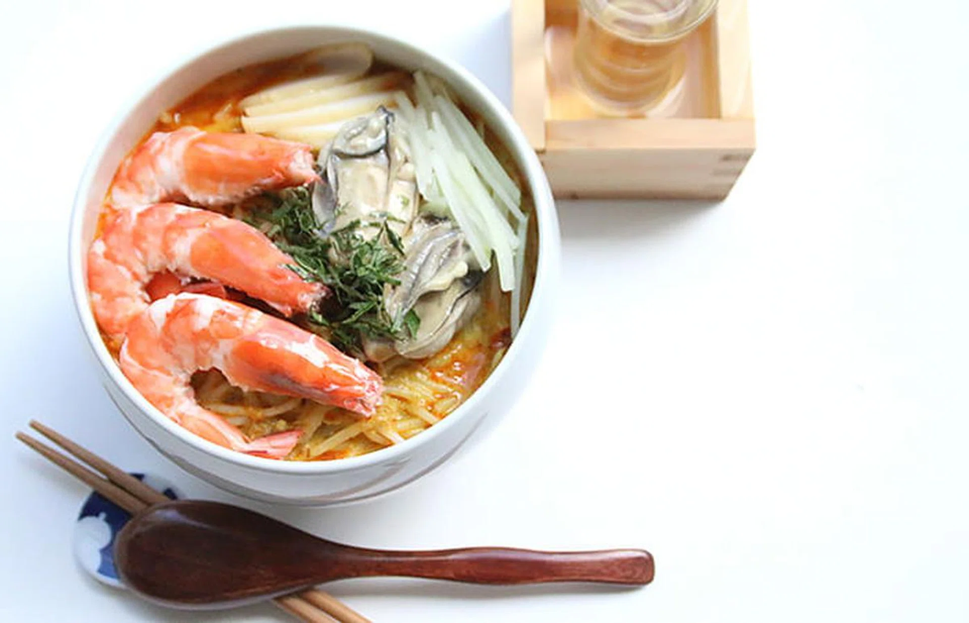 Ippin Cafe Bar's nyonya laksa uses oysters from Hiroshima and dashi jyutsu.
