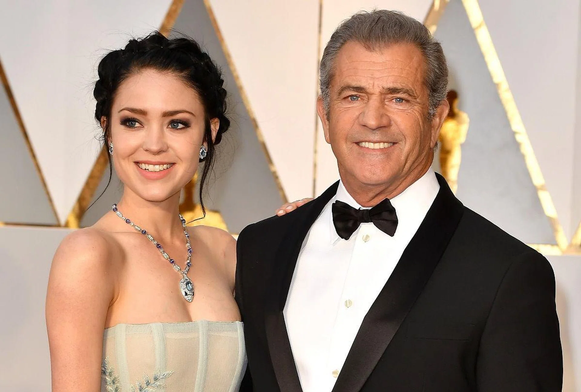 HOLLYWOOD, CA - FEBRUARY 26:  Actor/filmmaker Mel Gibson (R) and Rosalind Ross attend the 89th Annual Academy Awards at Hollywood &amp; Highland Center on February 26, 2017 in Hollywood, California.  (Photo by Jeff Kravitz/FilmMagic)