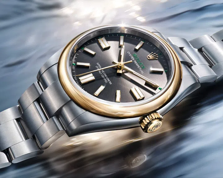 Rolex Oyster Perpetual 41 in yellow Rolesor with slate dial, green centenary accents and Oyster bracelet.