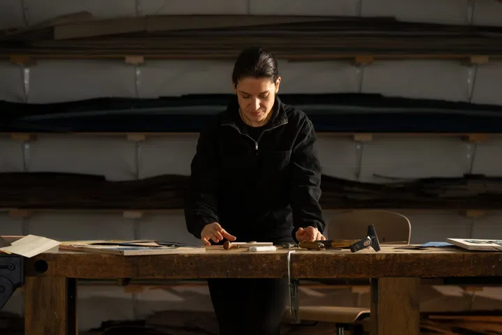Marquetry artist Anna Le Corno, creator of the three-dimensional wooden falcon for Vacheron Constantin’s Woodenwings watch.
