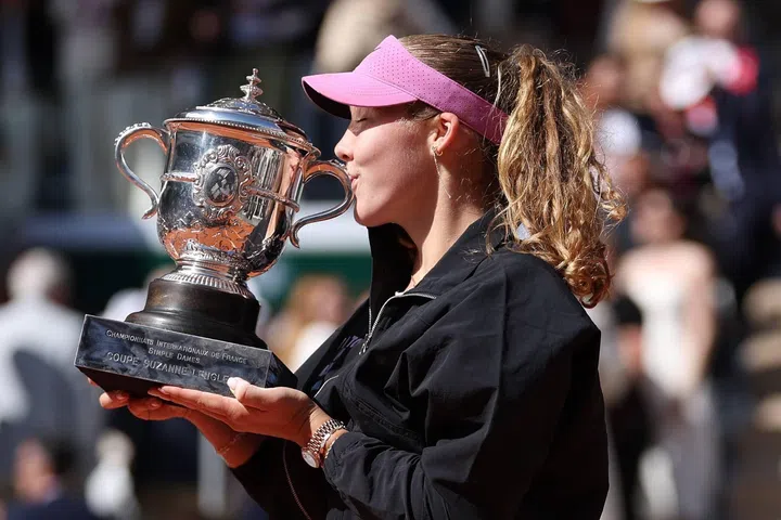 Russian tennis player and Rolex Testimonee Mirra Andreeva lifts the Suzanne-Lenglen trophy after winning the  Women’s Singles title at French Open 2026