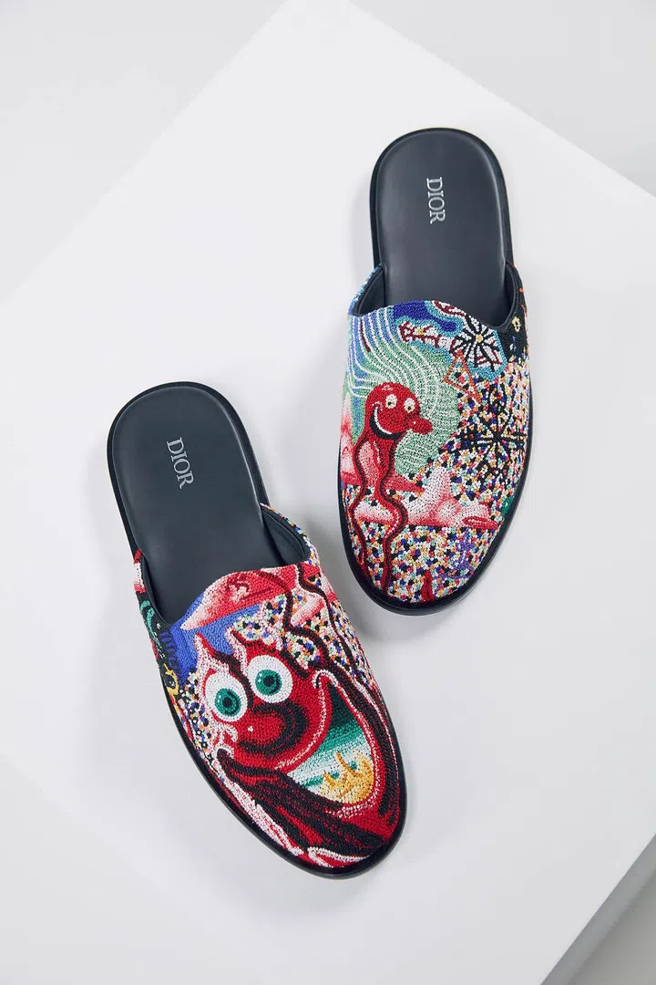 The Dior Men's Fall 2021 embroidered slippers, shot by Jackie Nickerson.