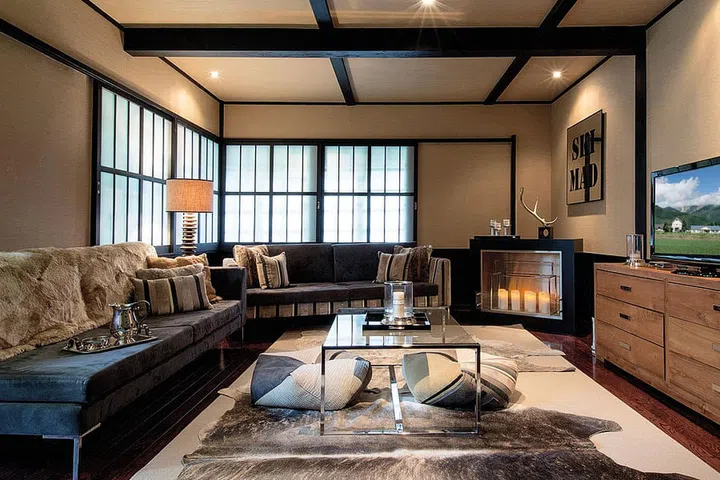 The apartment features timber beams and 12 shoji-style windows.