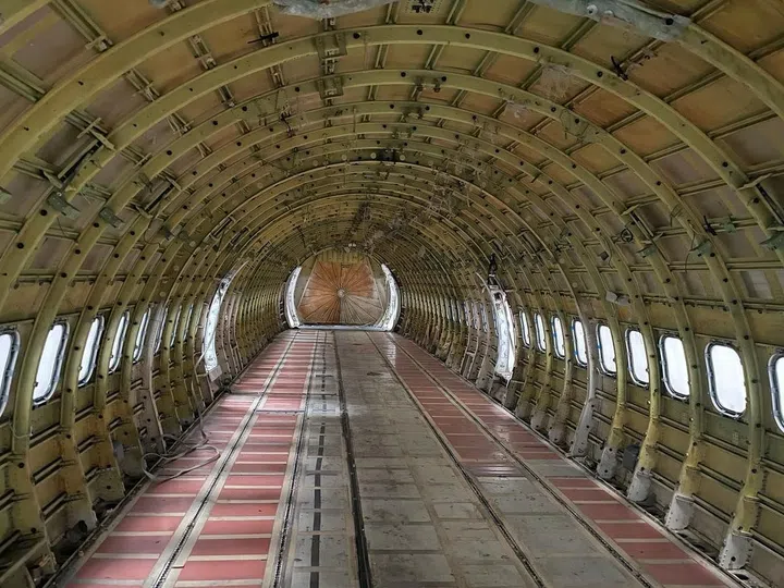 The inside of a stripped-down aeroplane. (Photo: Nandina REM)
