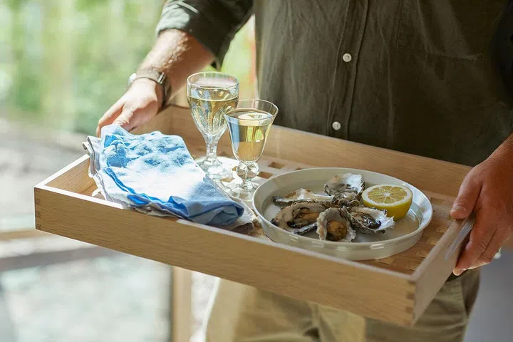 Functional with a secure grip, the Fionia Tray inspires confidence when carrying larger servings. (Photo: Fritz Hansen)