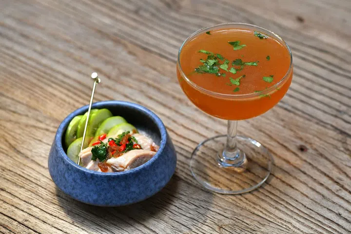ST20180227-1805834747-Lim Yaohui/Anjali Raguraman/ One of their signature drinks, hainanese chicken rice ($26 nett), at Amrith by BarSmiths on Feb 27, 2018. New bars that have popped up in the last few months are using traditional or heritage ingredients in their cocktails to showcase the flavours of Singapore and Southeast Asia. (ST PHOTO: LIM YAOHUI)