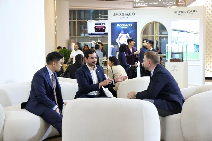 Visitors interacting in front of the Jacob & Co. and Greubel Forsey booths at the exhibition at Siam Paragon Bangkok Watch Week 2026