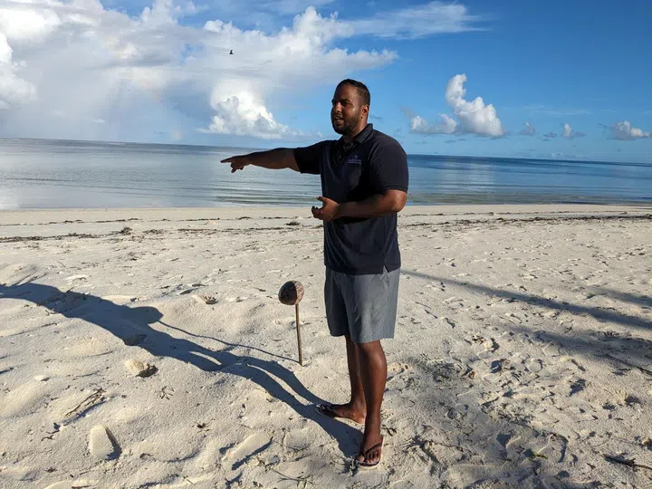 The resort’s environment manager, Dominique Dina, conducts a turtle patrol. (Photo: Kenneth SZ Goh)