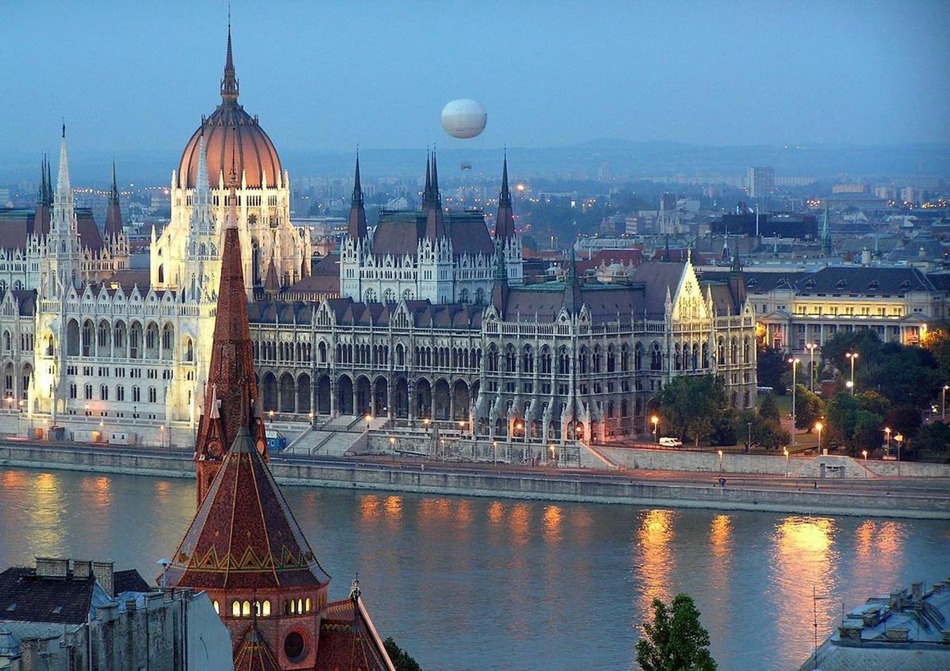 <h1>BUDAPEST</h1>
<strong>Book a table at:</strong> <a href="http://www.borkonyha.hu/?lang=eng">Borkonyha</a>, a Michelin-starred restaurant specialising in Hungarian wine and local cuisine. The bistro-style restaurant is a two-minute walk from the city's famous St. Stephen's Basilica, and much like its menu, combines traditional aesthetics (ornate chandeliers, bentwood coat racks) with a sleek, updated aesthetic. As for ordering, don't be put off: Veal brains as a starter won't ruin your evening.

<br><br><strong>Before dinner, if it's a weekday:</strong> Make your way from work to the Chain Bridge, the most beautiful crossing over the Danube River, and hop on the funicular that takes you directly up to the former Royal Palace. Take a romantic walk on the cobblestoned streets of the Castle District and peer out from the Fisherman's bastion for one of the best views of Budapest. Then get a pre-dinner drink at the wine bar <a href="http://visitbudapest.travel/arts-entertainment/budapest-nightlife/divino-wine-bar/">Divino</a>, which has unbeatable views of the Basilica.

<br><br><strong>Before dinner, if it's a weekend:</strong> Spend some time at the Rudas Bath on the bank of the Danube for some seriously leisurely R&amp;R. Wallow in the thermal waters under the Ottoman-era dome and then head to the rooftop and the recently renovated wellness section and take a plunge in the open-air pool with stunning views of the city. Don't forget to book a massage (or two).
