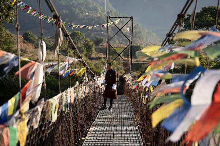 Ubiquitous in Bhutan, prayer flags typically come in red, green, yellow, white, and blue and are said to release prayers into the air when they flutter in the wind. (Photo: Josh van der Ploeg)