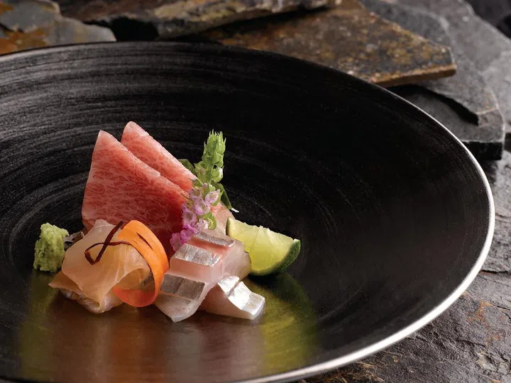 Pristine sashimi is sliced and served by Shinji’s masterchef Oshino in
the smaller dining room.