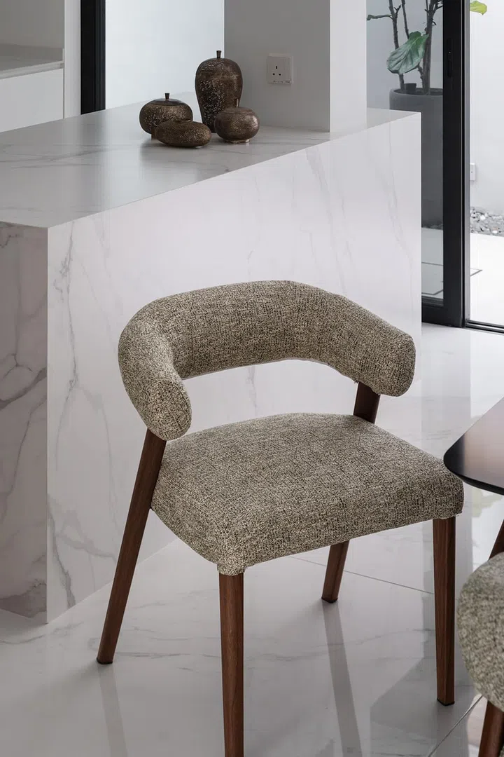 The Heirloom dining chair is designed with King Living’s Postureflex seating system, offering good back support. (Photo: ACO Architects and Architology Interiors)