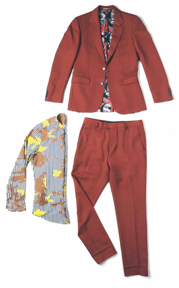 Lim chose a polyester wool suit and cotton shirt from Boss.