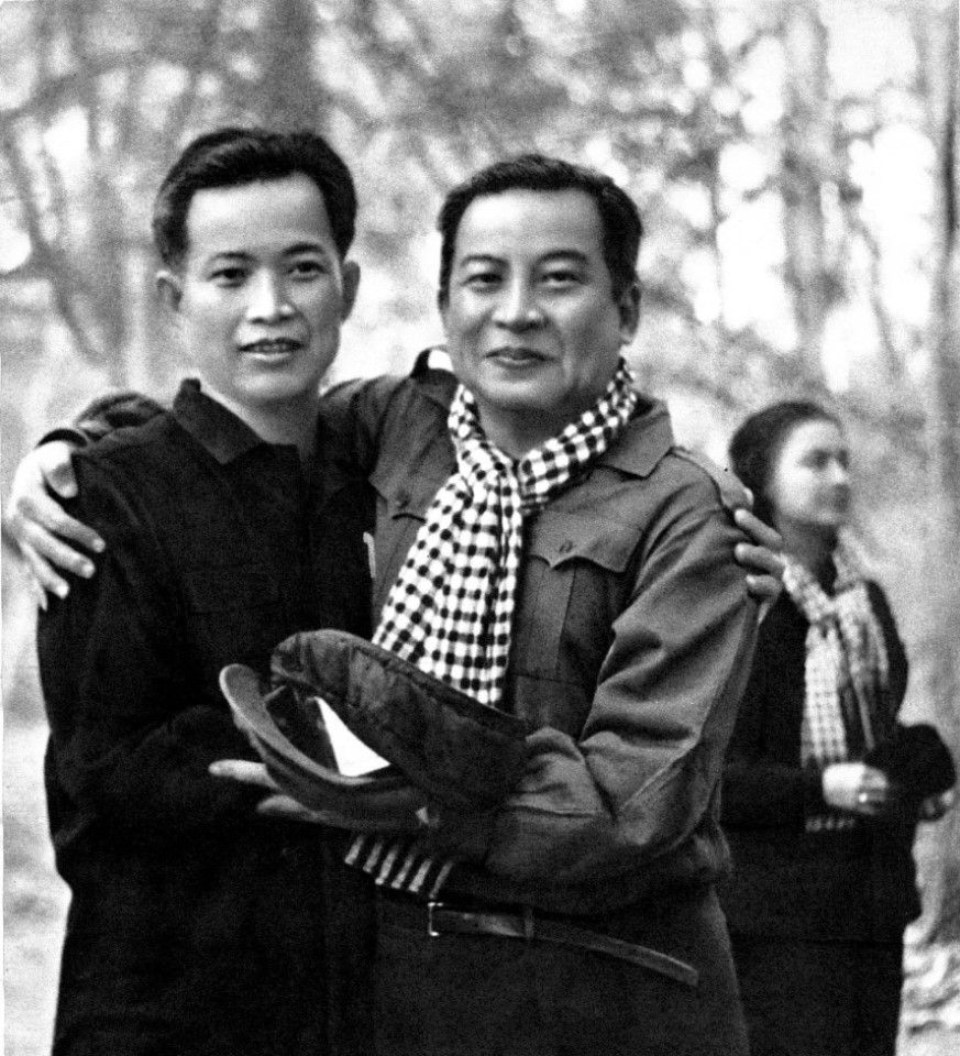 In 1978, Cambodian Prince Norodom Sihanouk (right) embraced Khieu Samphan, one of the top leaders of the Khmer Rouge, in the forests in Steung Treng province, northeast of Cambodia. Both were supported by China.