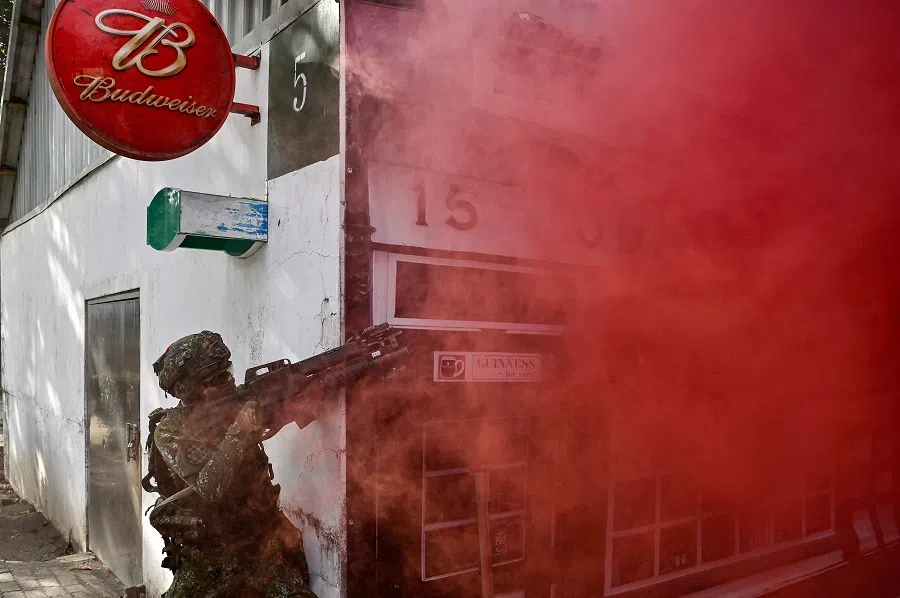 A Taiwanese soldier takes part in a demonstration at an army base in Kaohsiung, Taiwan, on 6 January 2022. (Sam Yeh/AFP)