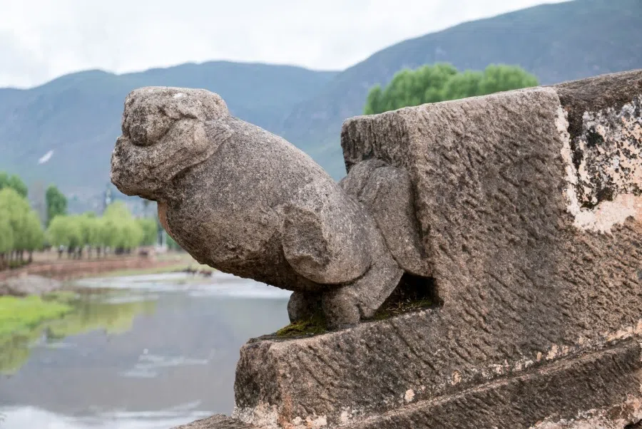 A carving of a giant salamander on Yujin Bridge in Shaxi Old Town, Yunnan, China. (iStock)