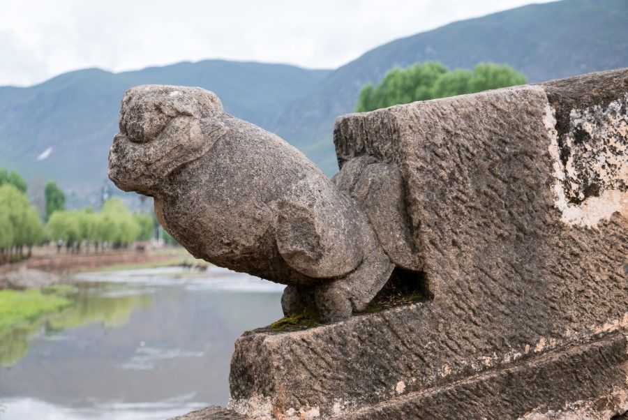 A carving of a giant salamander on Yujin Bridge in Shaxi Old Town, Yunnan, China. (iStock)