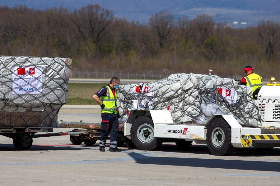 Medical supplies from China are unloaded at the Geneva Airport, Geneva, Switzerland, April 6, 2020. (Salvatore Di Nolfi/Pool via REUTERS)