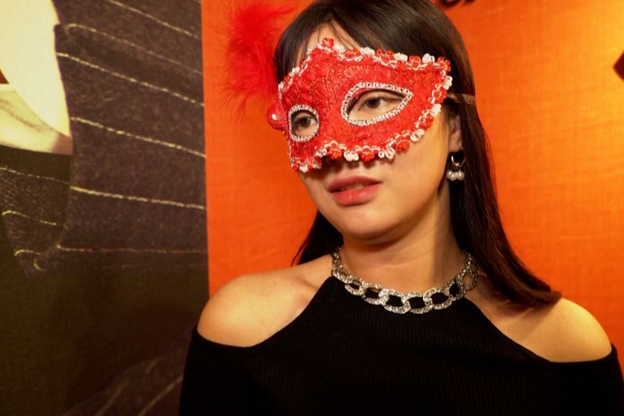 Attendee at a private masquerade singles mixer in Shanghai, China, on 13 January 2024. (Screen grab from Reuters)