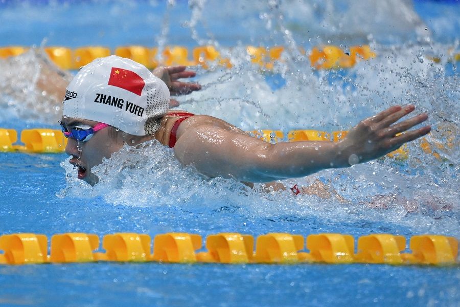 China's Zhang Yufei competes to take silver medal in the final of the women's 100m butterfly swimming event during the Tokyo 2020 Olympic Games at the Tokyo Aquatics Centre in Tokyo, Japan on 26 July 2021. (Jonathan Nackstrand/AFP)