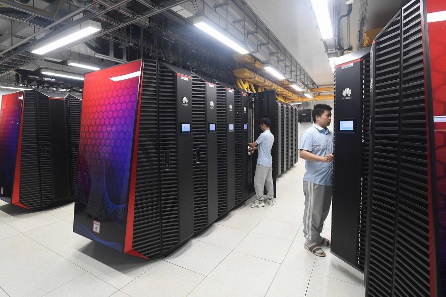 This photo shows engineers working at Wuhan Supercomputer Center, Hubei province, China, on 24 May 2023. (AFP)