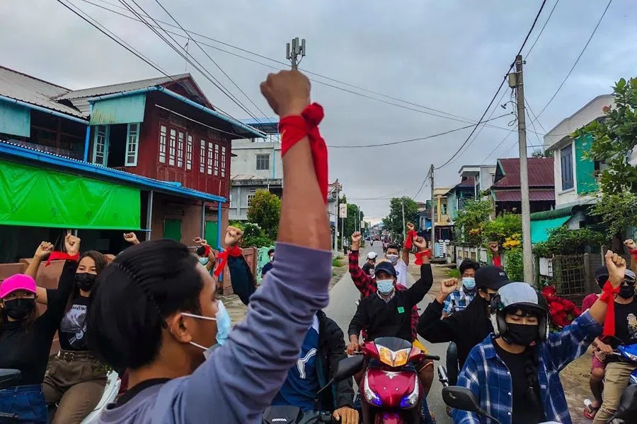 This handout photo taken and released by Dawei Watch on June 28 2021, shows protesters taking part in a demonstration against the military coup in Dawei. (Handout/Dawei Watch/AFP)