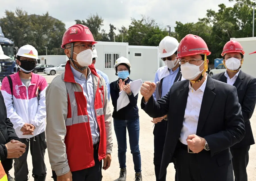 Hong Kong's Chief Secretary for Administration John Lee receiving the handover of a new Covid-19 isolation facility in Tsing Yi, 1 March 2022. (CNS)
