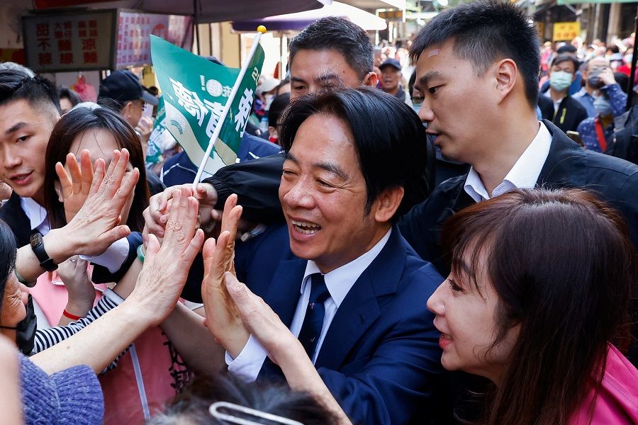 William Lai Ching-te, Taiwan's vice-president and the ruling Democratic Progressive Party's (DPP) presidential candidate, interacts with supporters during an election campaign event in Taipei, Taiwan, on 7 December 2023. (Ann Wang/Reuters)