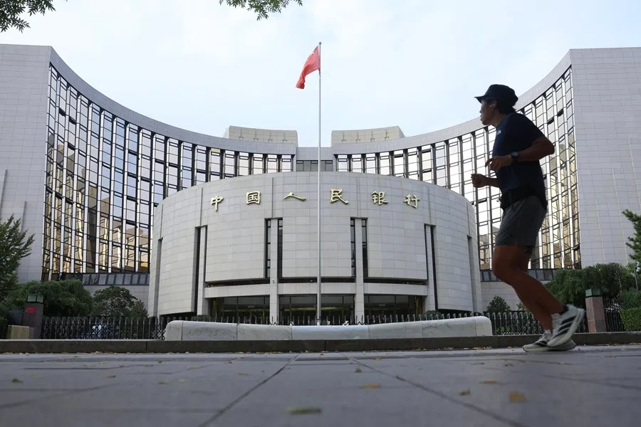 A person jogging past the People’s Bank of China in Beijing, 20 September 2026