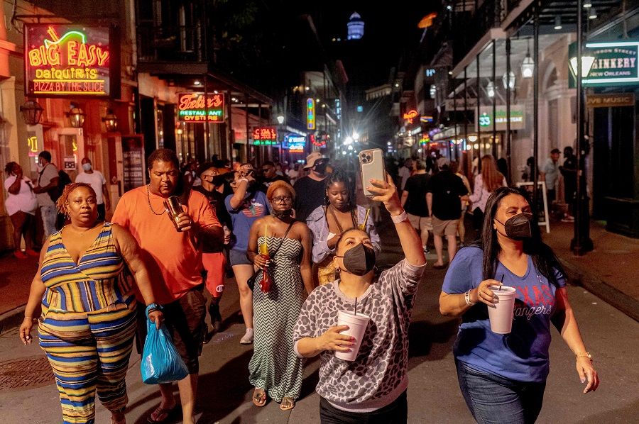 Party-goers on Bourbon Street in New Orleans, US on 13 August 2021. (Emily Kask/AFP)