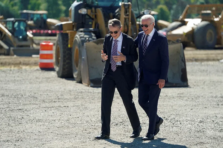 US President Joe Biden walks with Intel CEO Pat Gelsinger as he attends the groundbreaking of the new Intel semiconductor manufacturing facility in New Albany, Ohio, US, on 9 September 2022. (Joshua Roberts/Reuters)