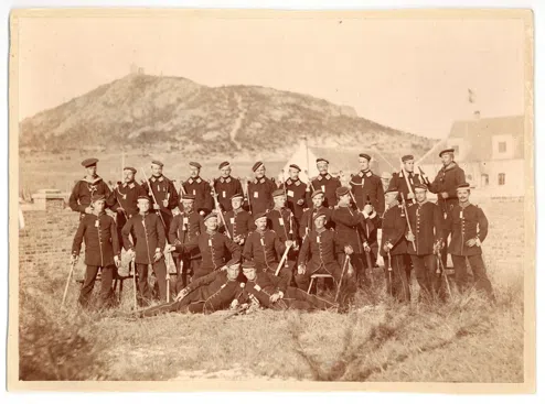 German naval soldiers in front of the first German building constructed in Qingdao, 1890s.