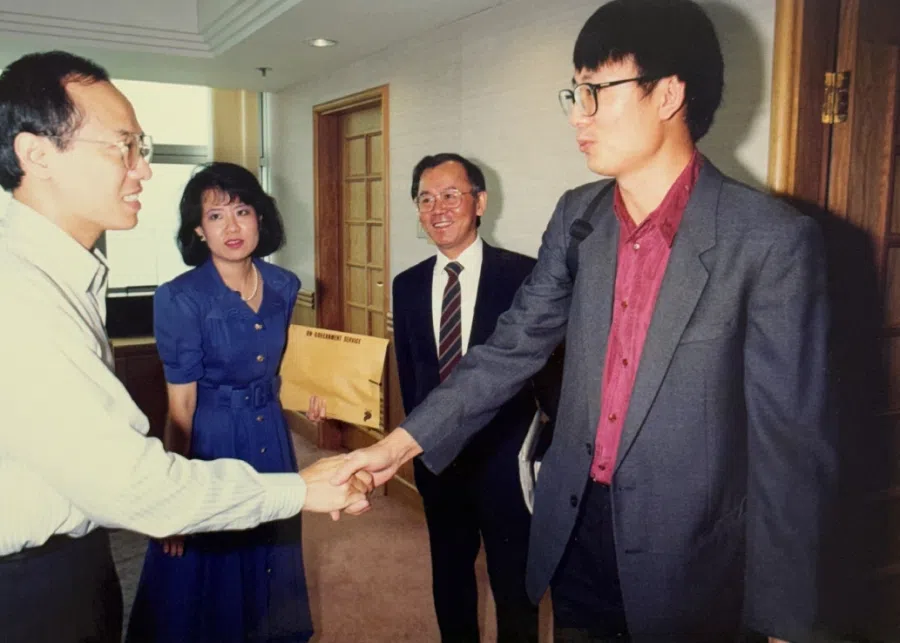 Interviewing then Minister for Information and the Arts George Yeo (left), 1992.