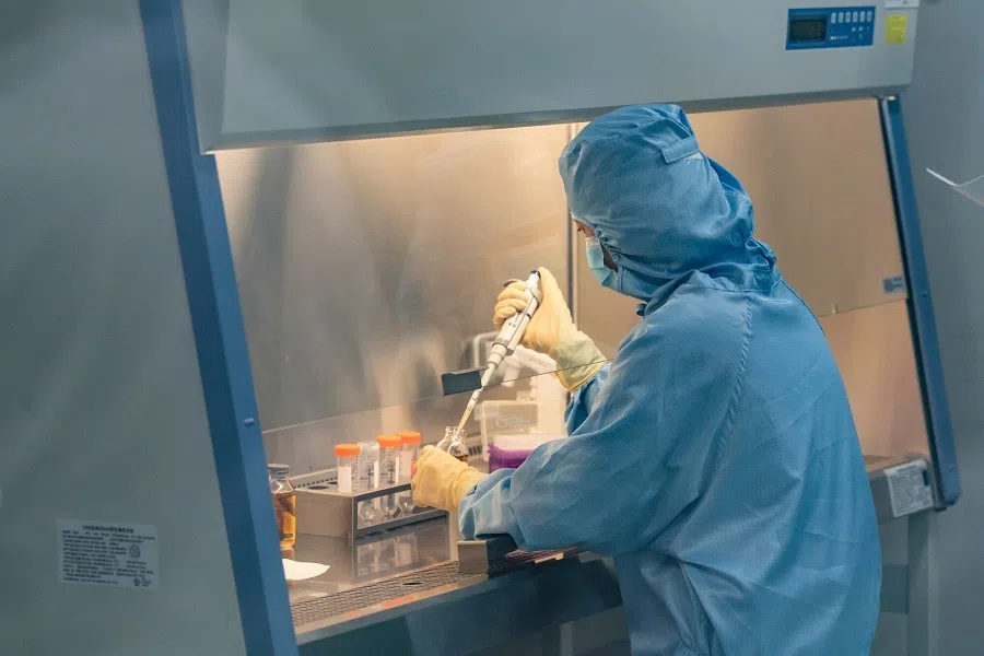 A technician works inside a production laboratory for CAR-T cell therapies at the IASO Biotechnology Co. facility in Nanjing, China, on 9 June 2025. The company develops blood tumour cell drugs, antibody drugs and other related drugs.