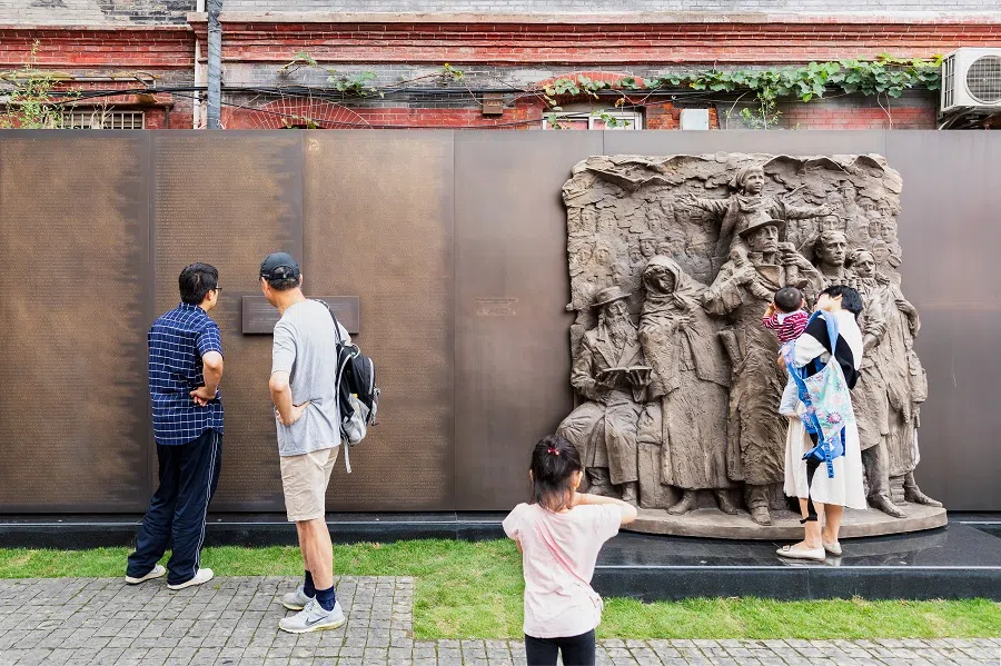 Monument at entrance to Shanghai Jewish Refugees Museum in Hongkou, with name list and relief of Jewish refugees who lived in Shanghai during WWII, on 5 October 2019.