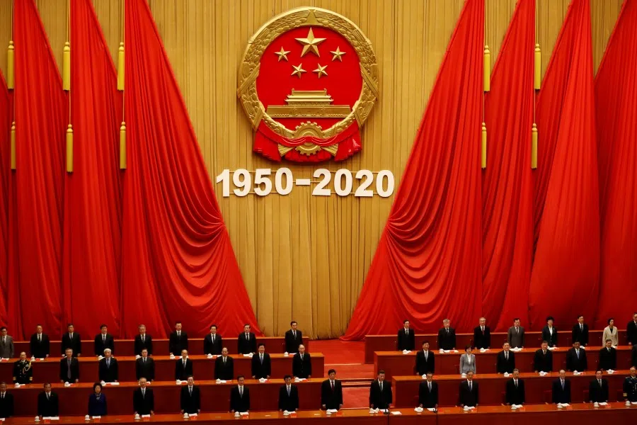 China's President Xi Jinping and Premier Li Keqiang take part in an event marking the 70th anniversary of the Chinese People's Volunteer Army's participation in the Korean War at the Great Hall of the People in Beijing, China, 23 October 2020. (Carlos Garcia Rawlins/REUTERS)