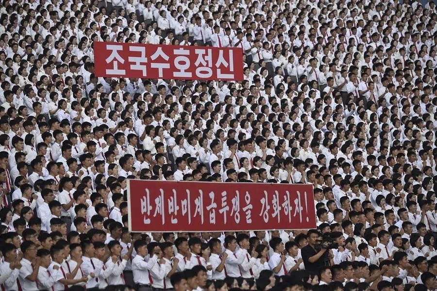 Participants gather at the Youth Park Open-Air Theatre in Pyongyang Municipality in Pyongyang, North Korea, on 24 June 2026, to mark the "Day of Struggle Against US Imperialism".