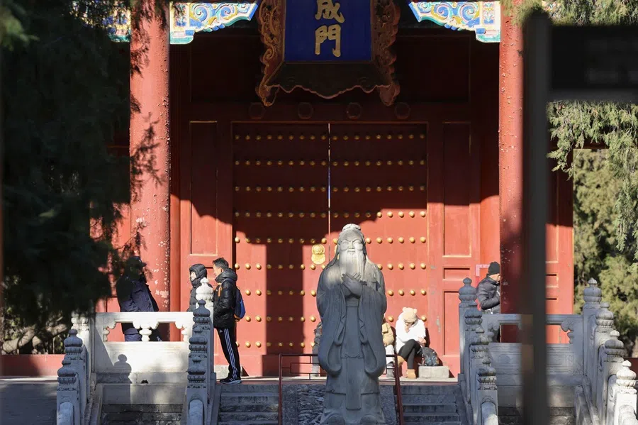People visit the Temple of Confucius in Beijing on 2 December 2025. (Ludovic Marin/AFP)