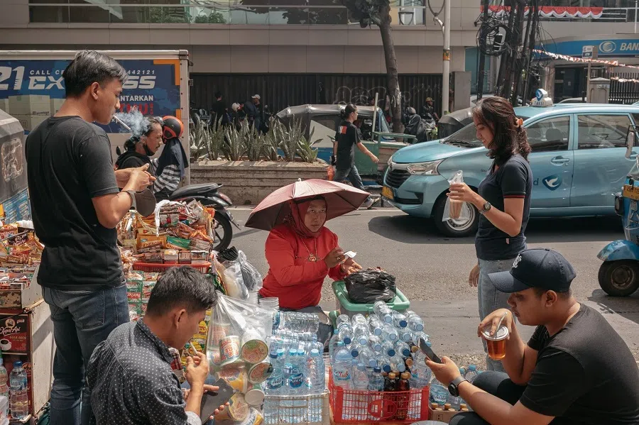 People at Tanah Abang market in Central Jakarta, Indonesia, on 15 August 2022. (Muhammad Fadli/Bloomberg)