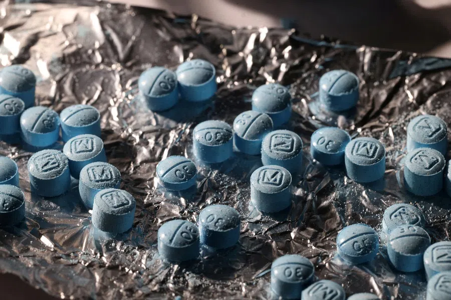 Pills are seen pressed from a pill press at Reuters’ office in New York City, US, on 24 June 2024. (Andrew Kelly/Reuters)