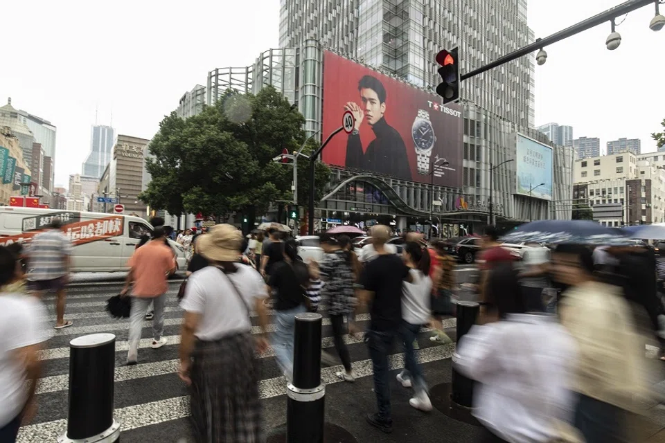 Visitors on Nanjing East Road in Shanghai, China, on 30 September 2023. (Qilai Shen/Bloomberg)