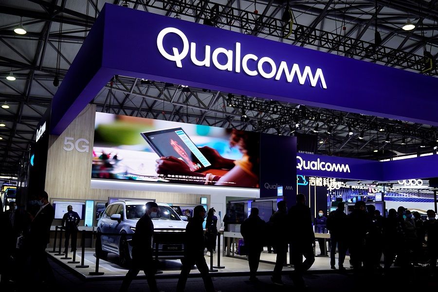 People visit a Qualcomm booth at the Mobile World Congress (MWC) in Shanghai, China, 23 February 2021. (Aly Song/File Photo/Reuters)